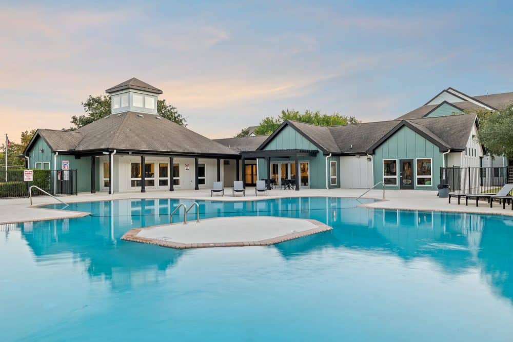 the outpost san marcos apartments near texas state university resort style pool clubhouse exterior