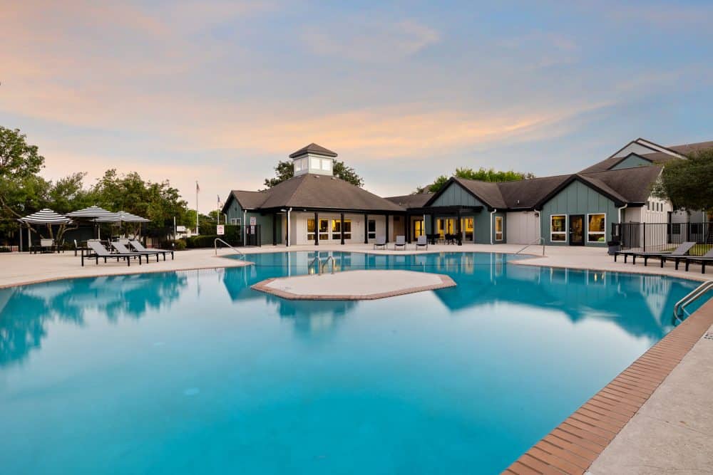 the outpost san marcos apartments near texas state university resort style pool sunset